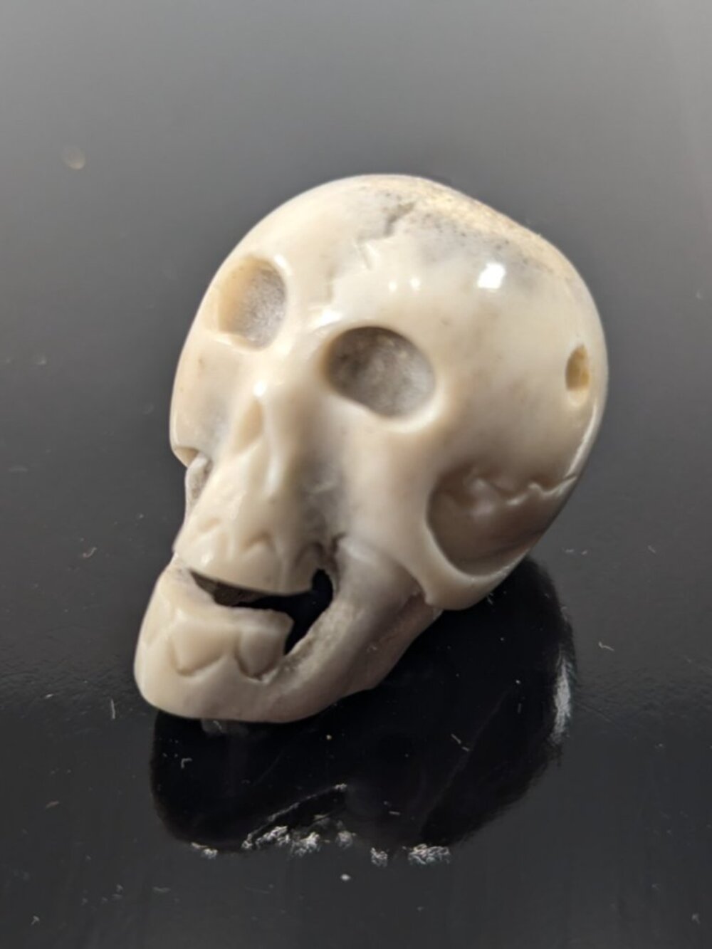 Vintage Memento Mori Deer Antler Carved Skull pendant, human skull bead